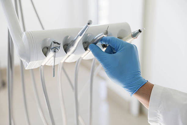 Professional Tooth Extraction technician working in Raeford, NC